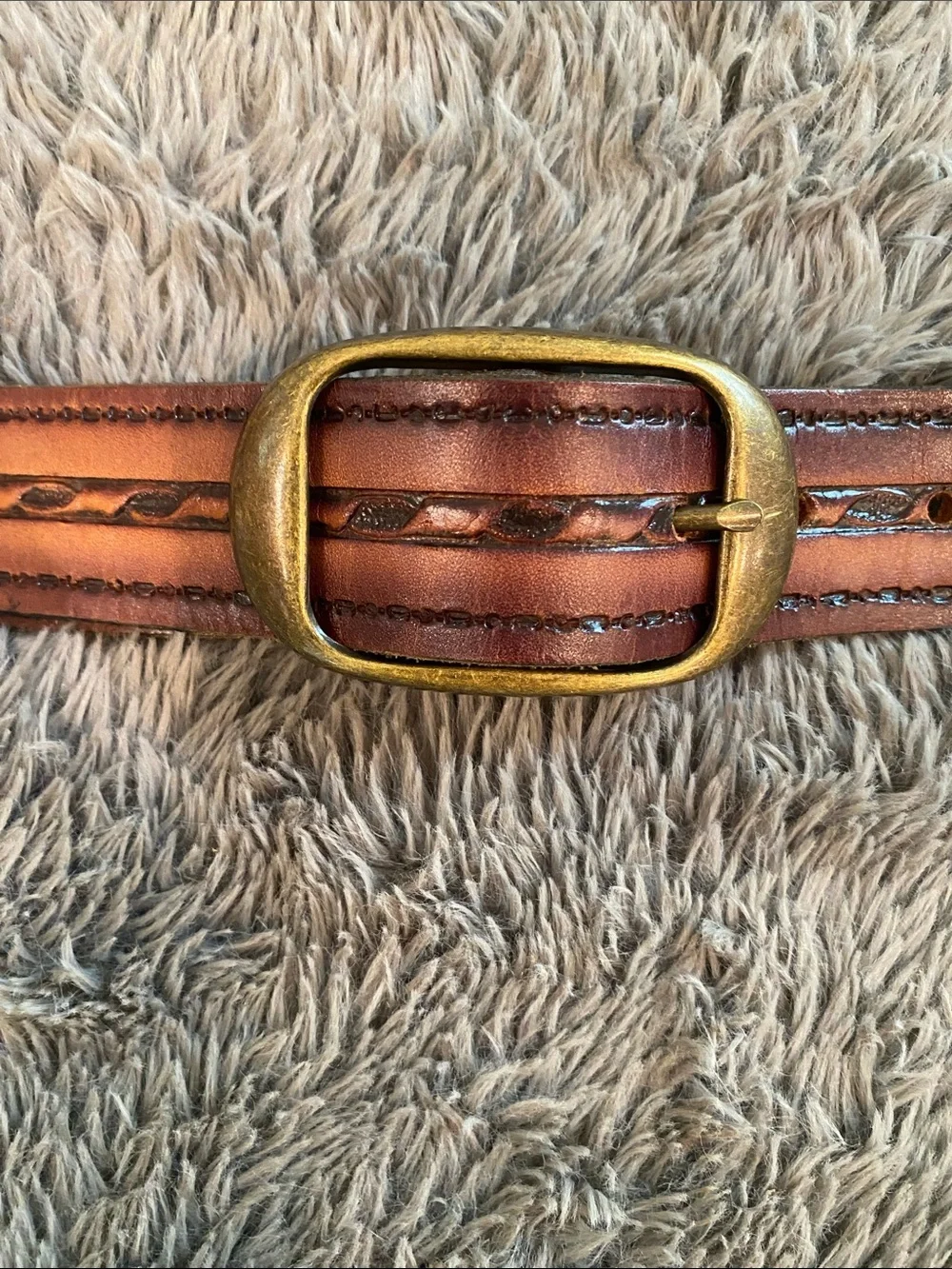 Vintage brown tooled leather belt 47” long 1.5” wide brass
